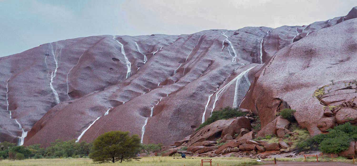 Water running down Uluru / Ayres Rock in the Northern Territory