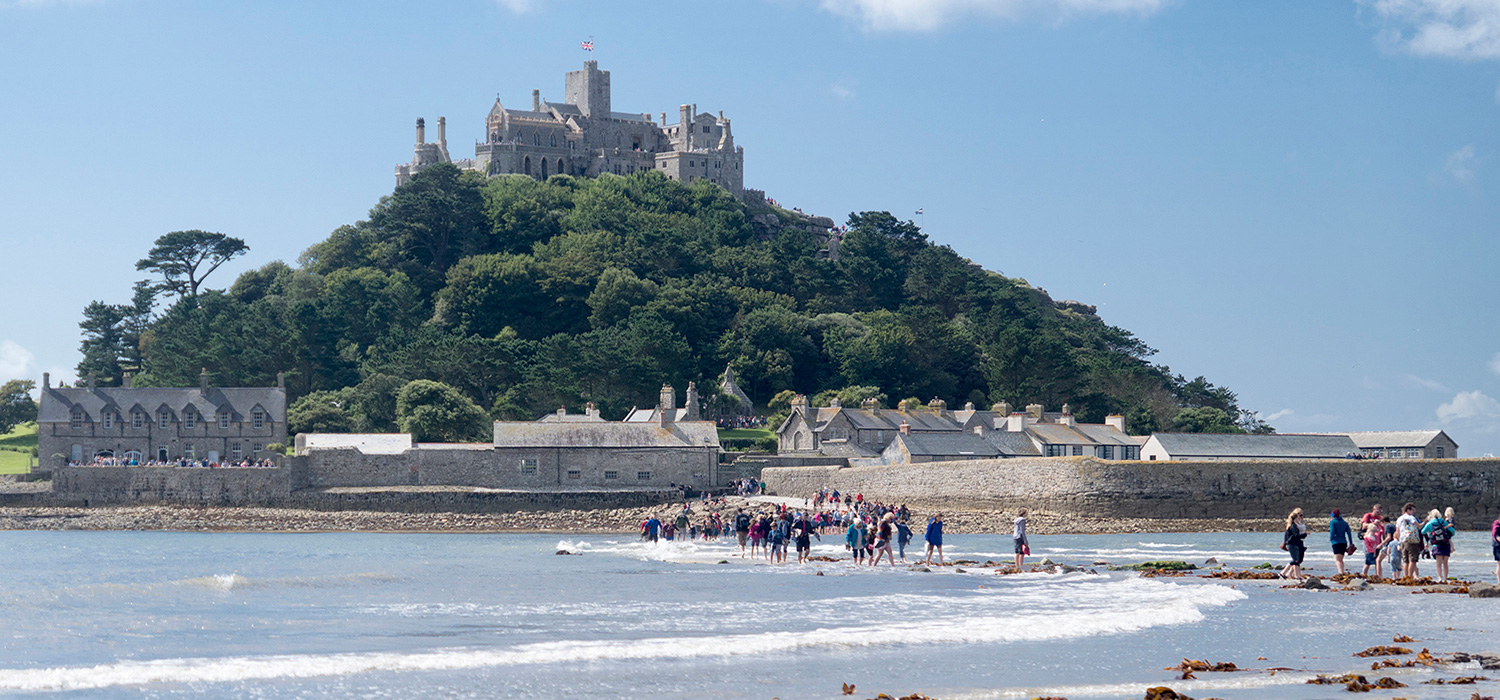  St Michael's Mount in Cornwall, is a rocky island with a church and castle.